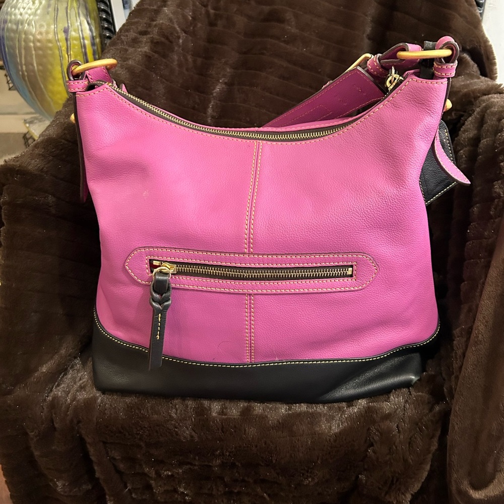 Pink and black Dooney Bourke leather handbag